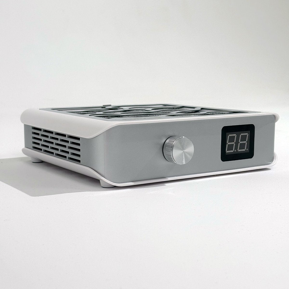 Widok z boku na pochłaniacz pyłu Holivica Pro 2 z pokrętłem regulacji mocy i wyświetlaczem LED.