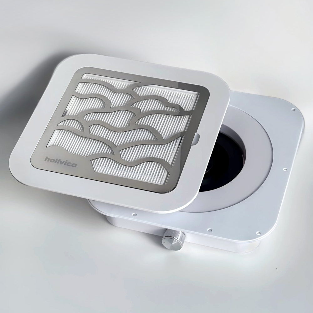 Zestaw elementów pochłaniacza Holivica Pro 2 – obudowa, filtr HEPA i kratka montażowa.